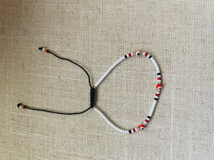 Red and white evil eye bracelet